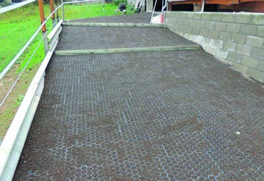 A stable yard finished with Paddock Slab